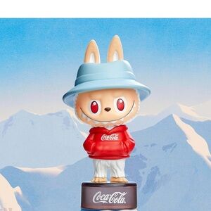 Hold For NIKKI Coca-Cola The Monsters Figurine with Blue Hat and Red Shirt